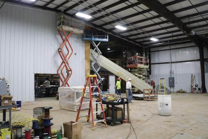 Tearing down the wall to conjoin the Powder building and new expansion. 