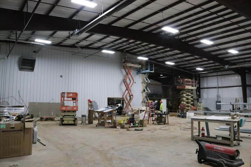 Tearing down the wall to conjoin the Powder building and new expansion. 