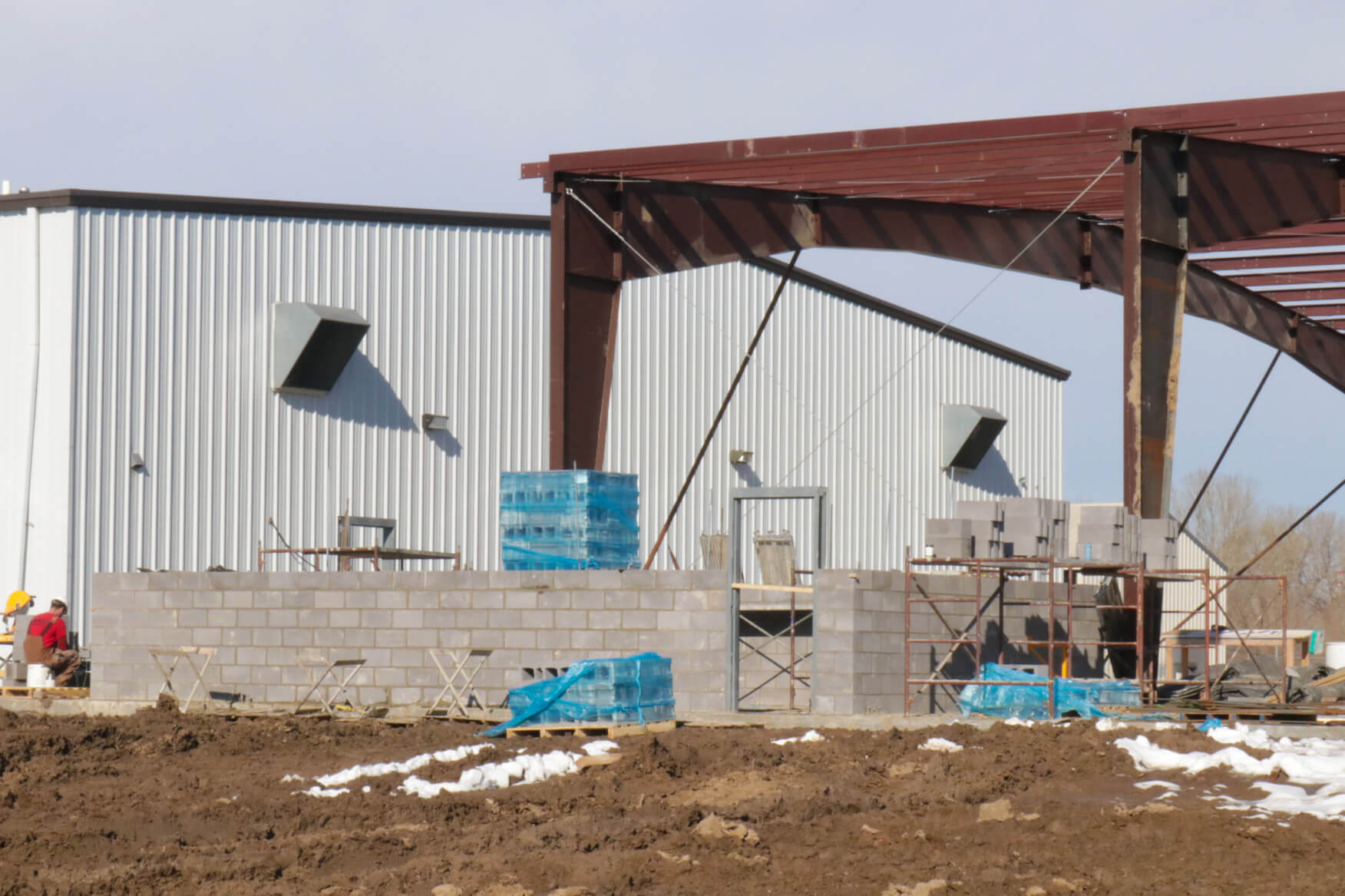 Laying brick for the storm shelter.