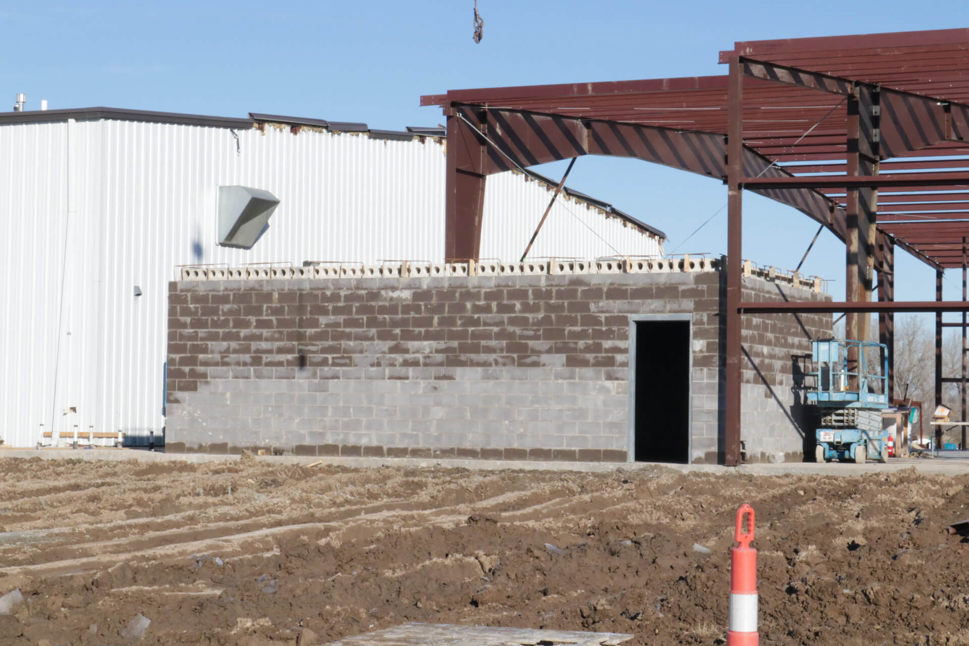 Finishing the red iron structure and storm shelter. 